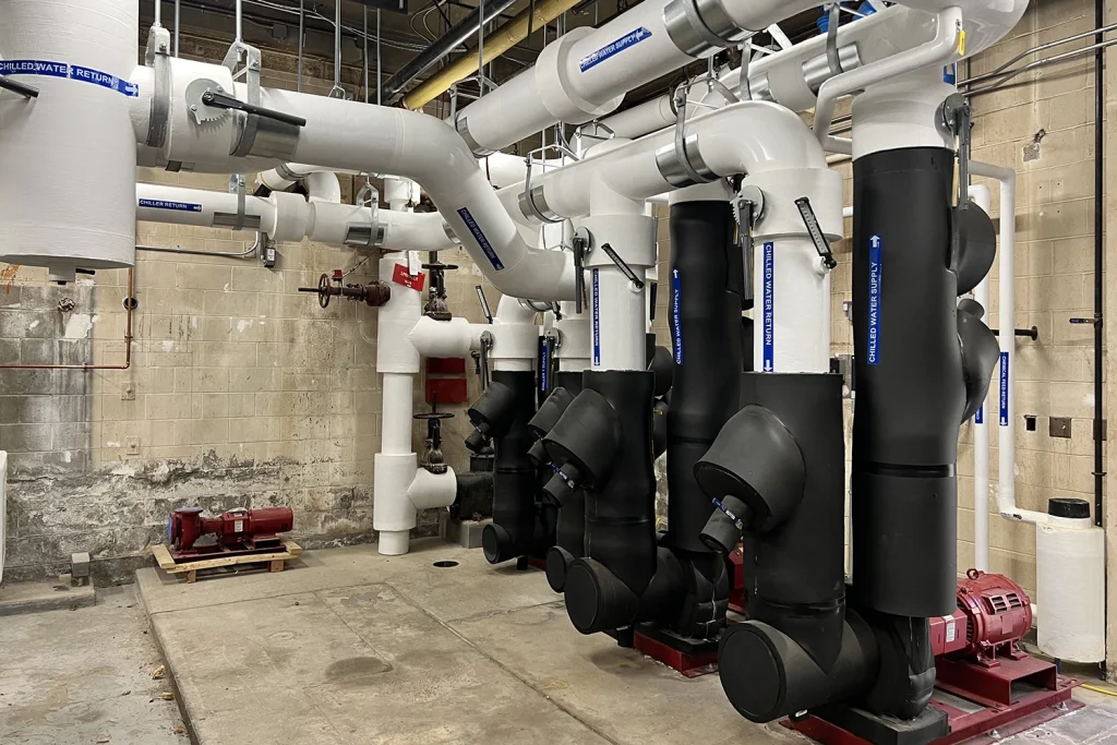 Large diameter mechanical and plumbing piping installed in industrial facility